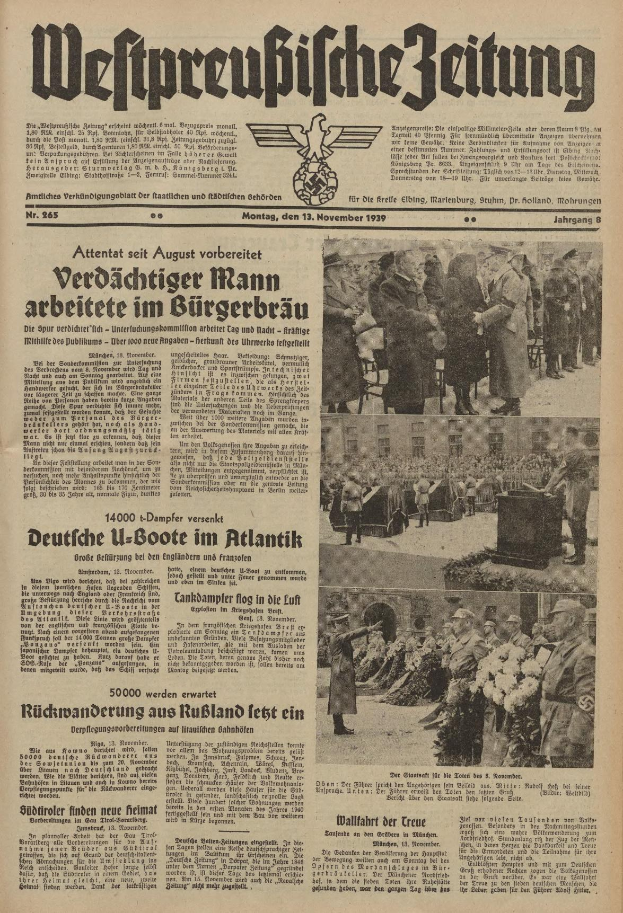 Schwarze und weiße Titelseite einer deutschen Zeitung vom 13. November 1939 mit der Schlagzeile "Weitpreubliche Zeitung", die eine Gruppe von Menschen in traditioneller deutscher Kleidung in einer feierlichen Atmosphäre zeigt.
